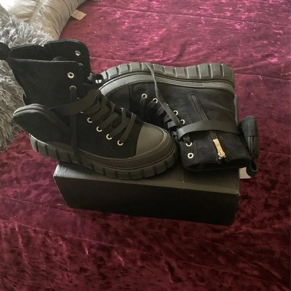 Combat boots with bags attached around